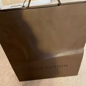 Brand new Louis Vuitton brown paper bag.  19x20